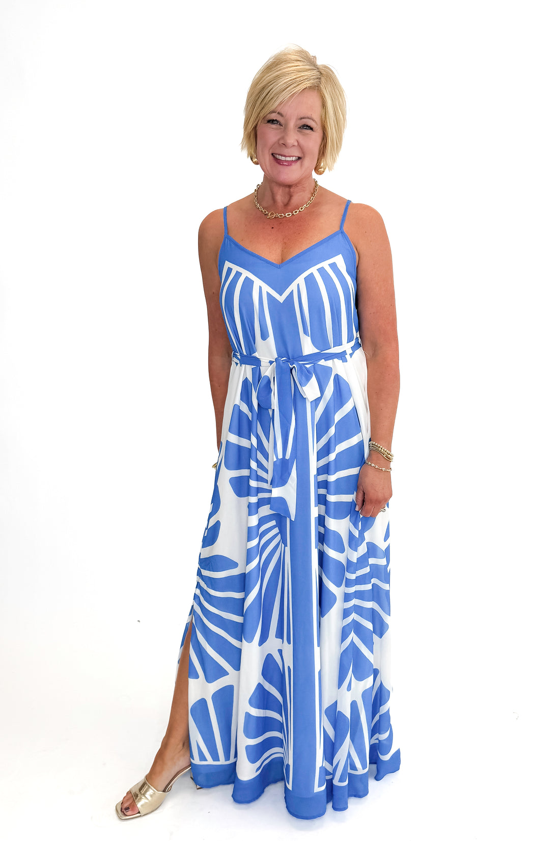 Front view of woman wearing Blue Printed Maxi Dress With Tie against white studio background.