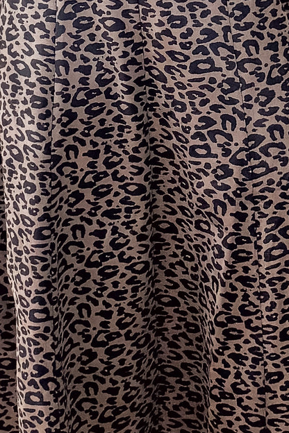 Detailed view of Leopard Suede Midi Dress pattern.