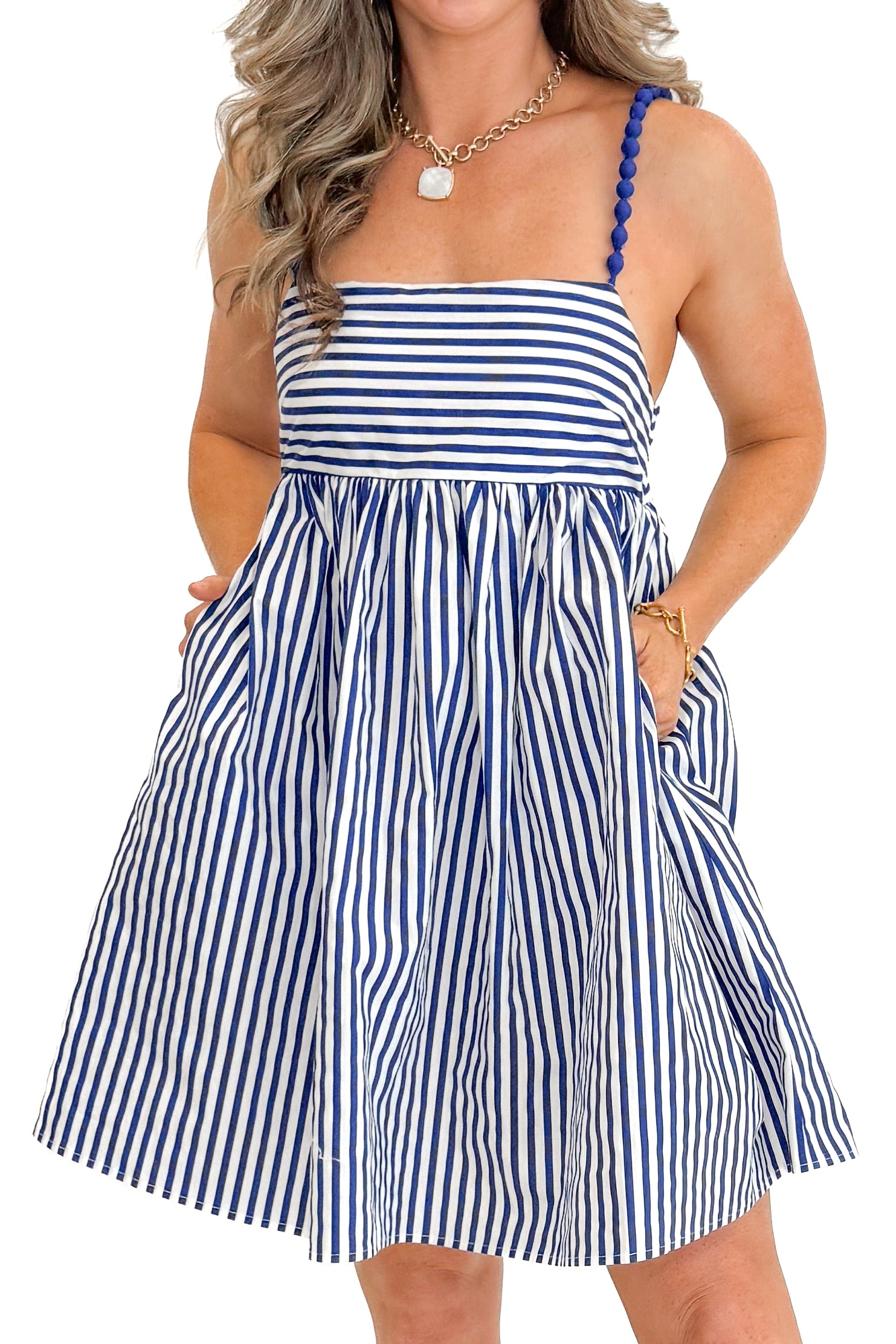 Front detail view of woman wearing Blue &amp; White Striped Bead Strap Dress with sandals against white studio background.