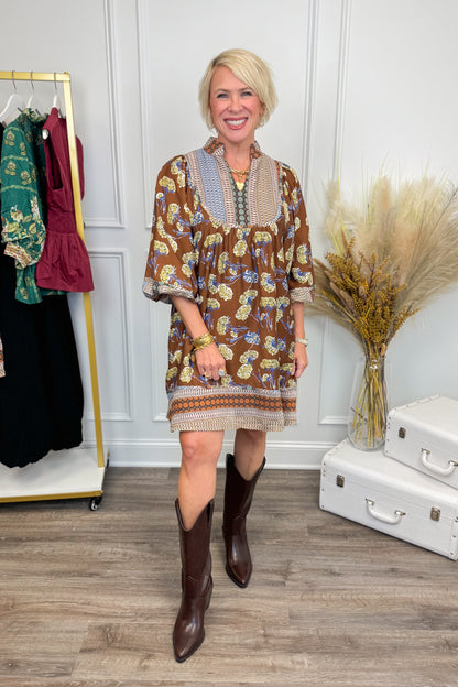 Woman wearing Golden Opportunity Brown &amp; Multi Mixed Print 3/4 Sleeve Dress - front view showing vibrant mixed print pattern and 3/4 sleeves