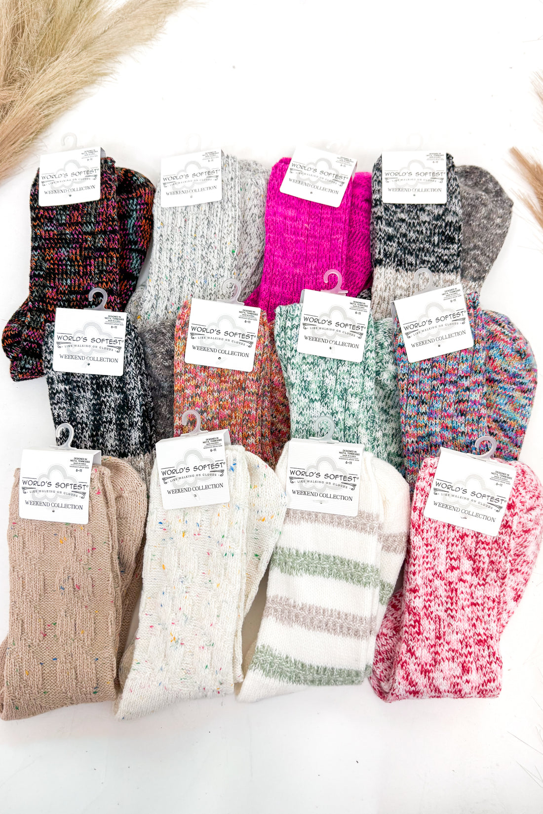 an array of colorful socks against a white background