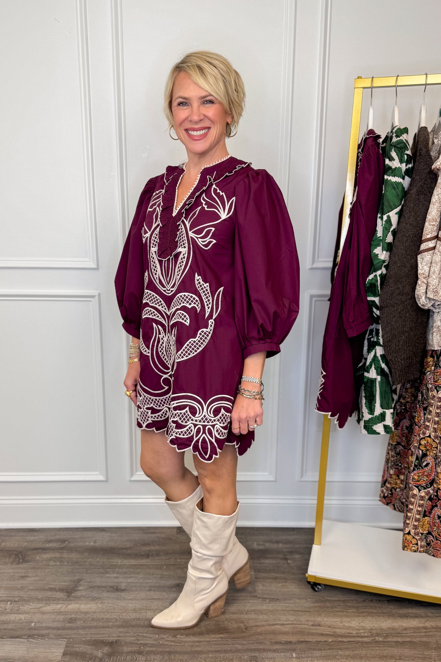 woman wearing burgundy embroidered dress 