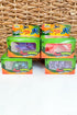 Five boxes of Flex & Play toy figures on a wicker surface