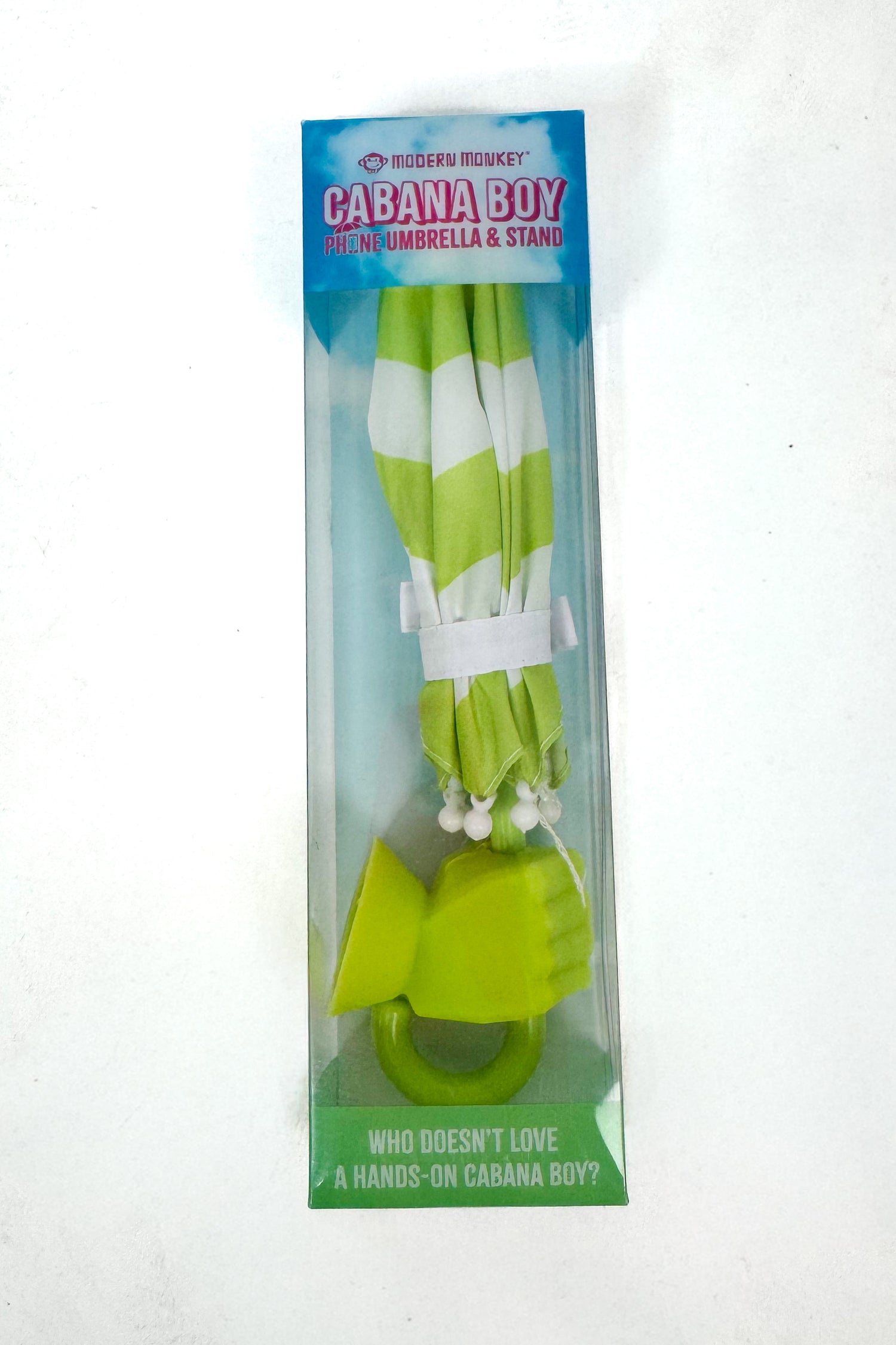 Green and white striped umbrella with stand in packaging on a white background