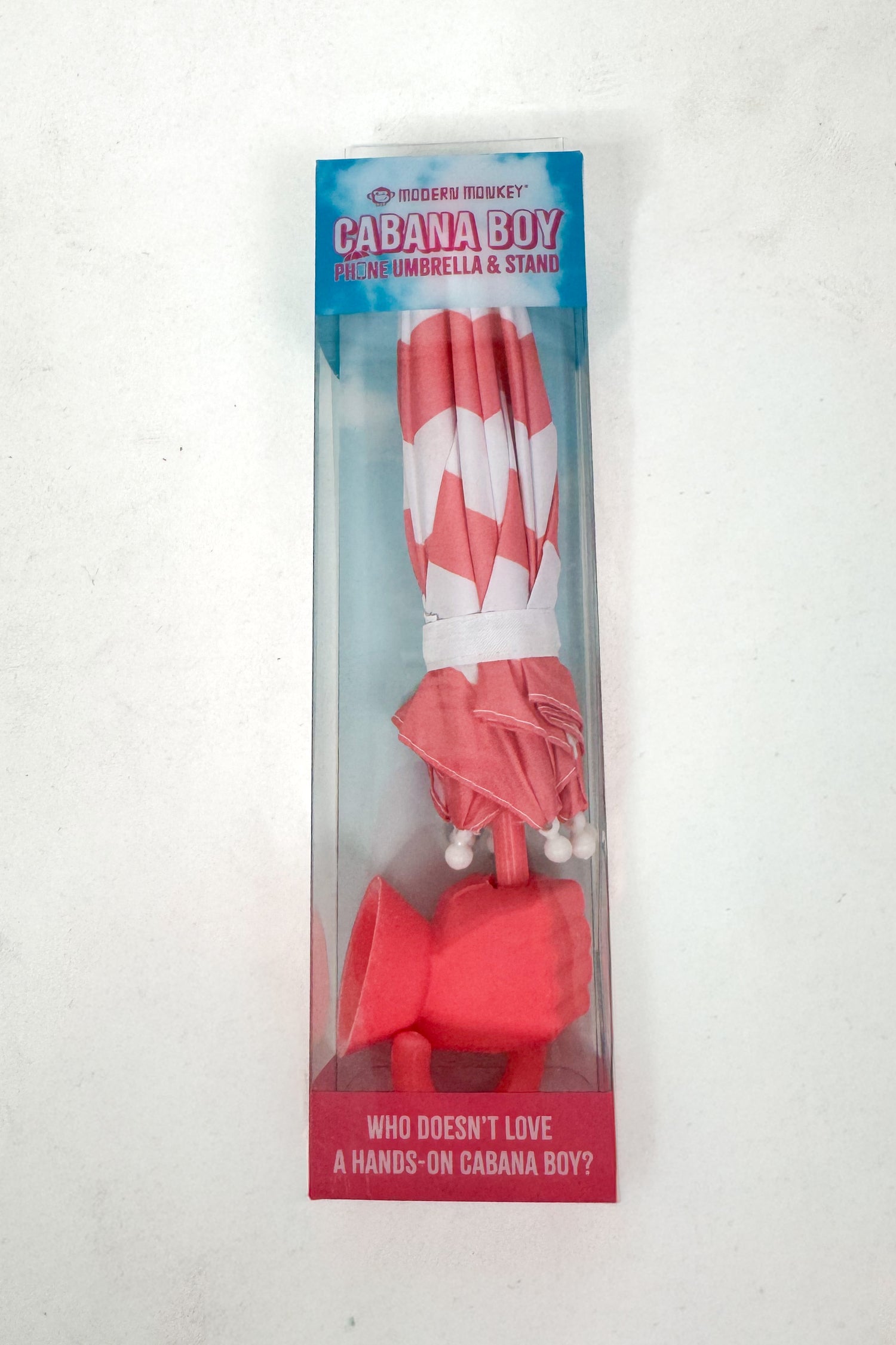 Red and white umbrella with packaging on a white background
