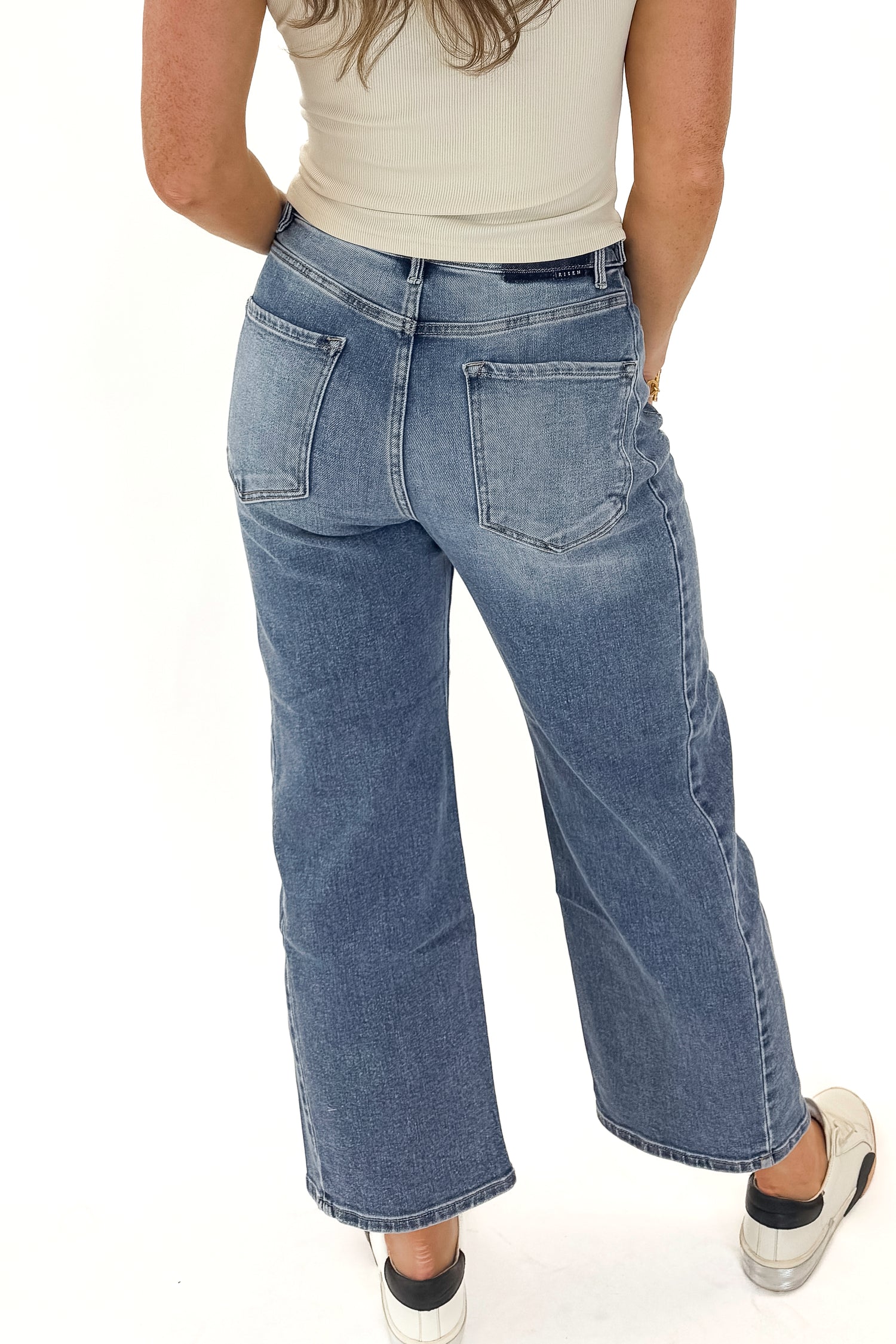 Katie medium wash adjustable waist barrel jeans by Risen - back view on model