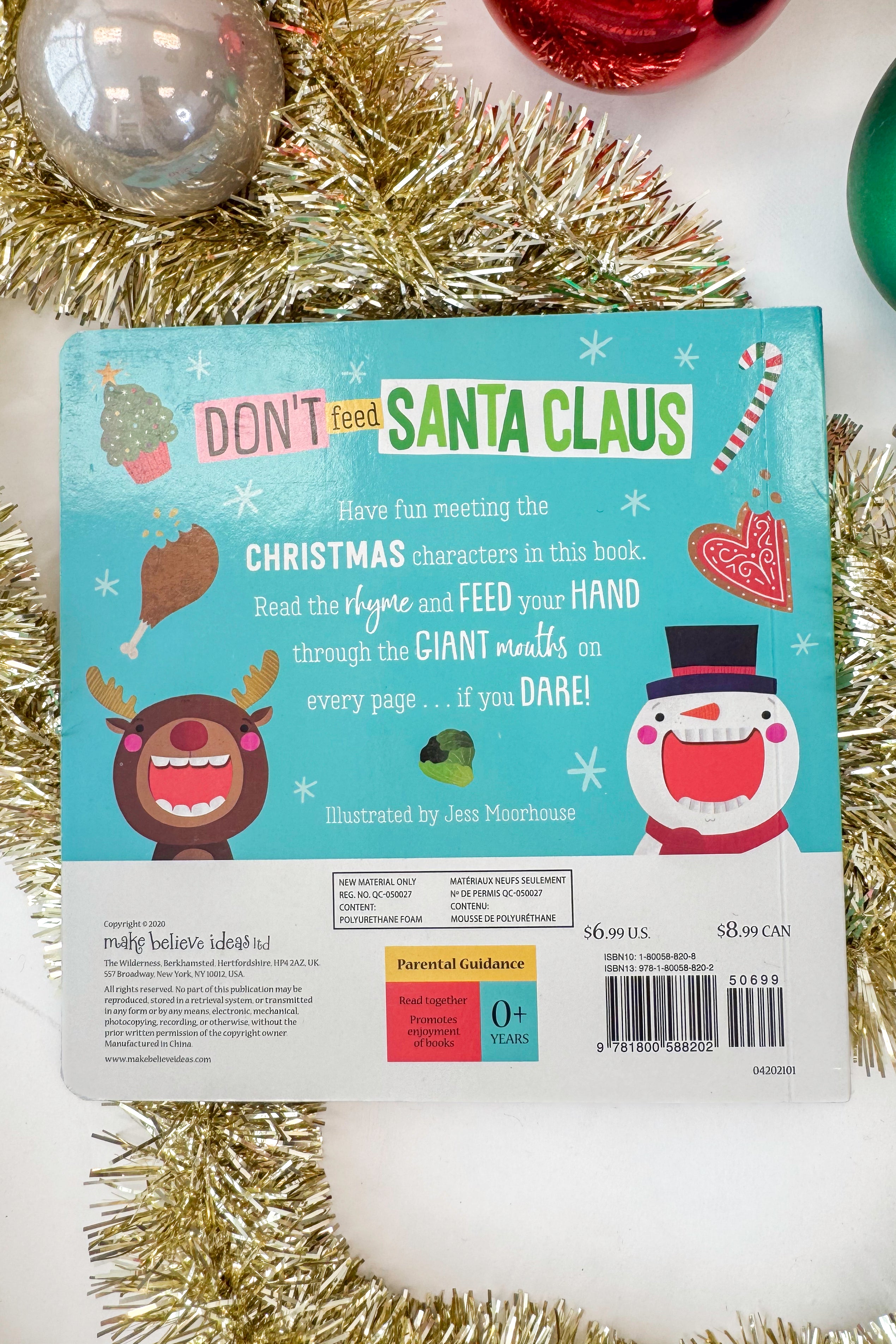 Book cover with a cartoon Santa Claus face and text &
