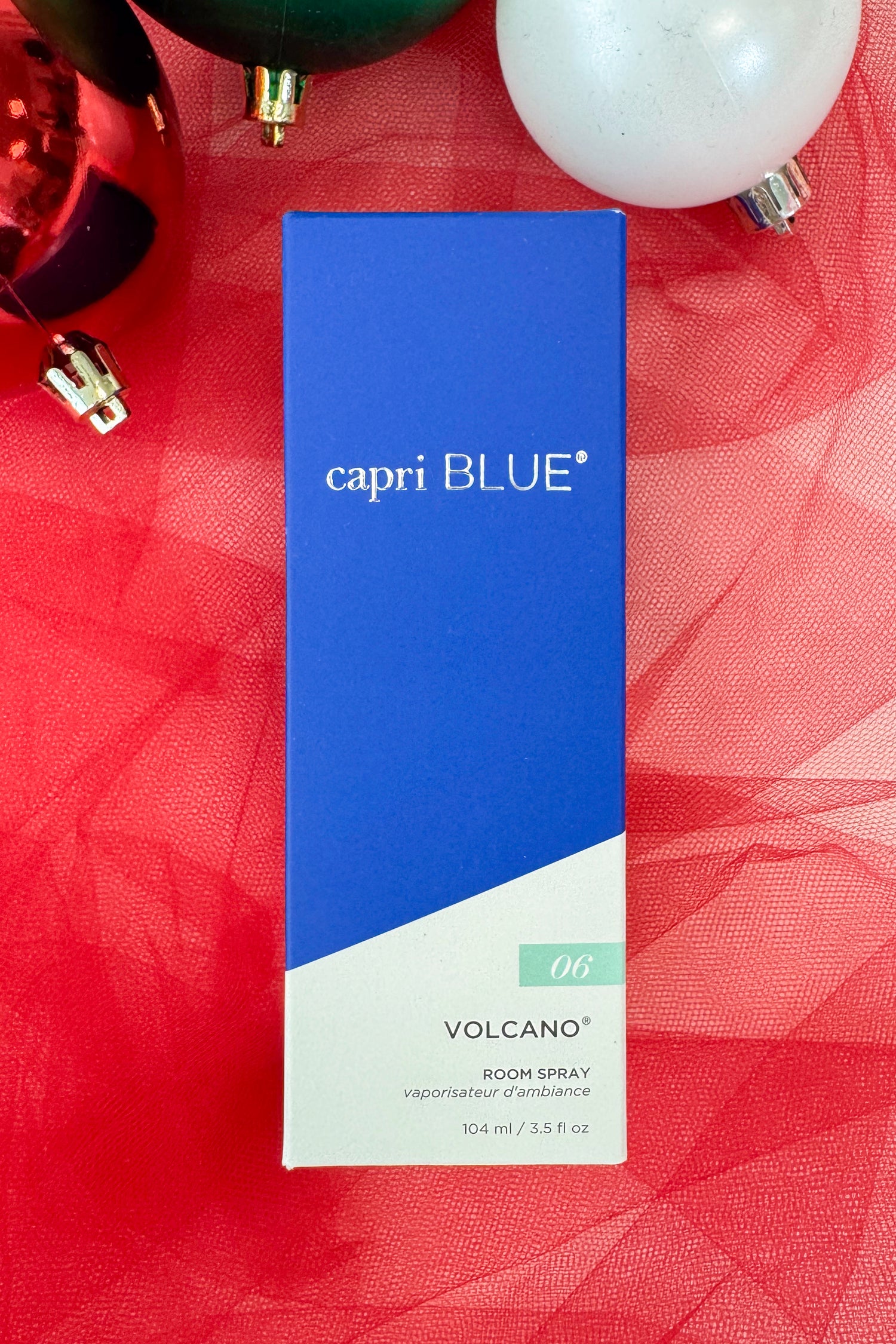 Blue room spray bottle with &