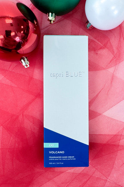 Capri Blue Volcano fragranced hand cream on a festive background