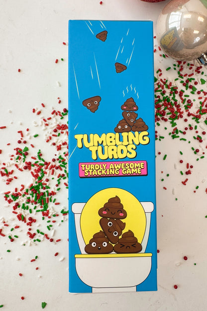Box of Tumbling Turtles stacking game with blue background and yellow text