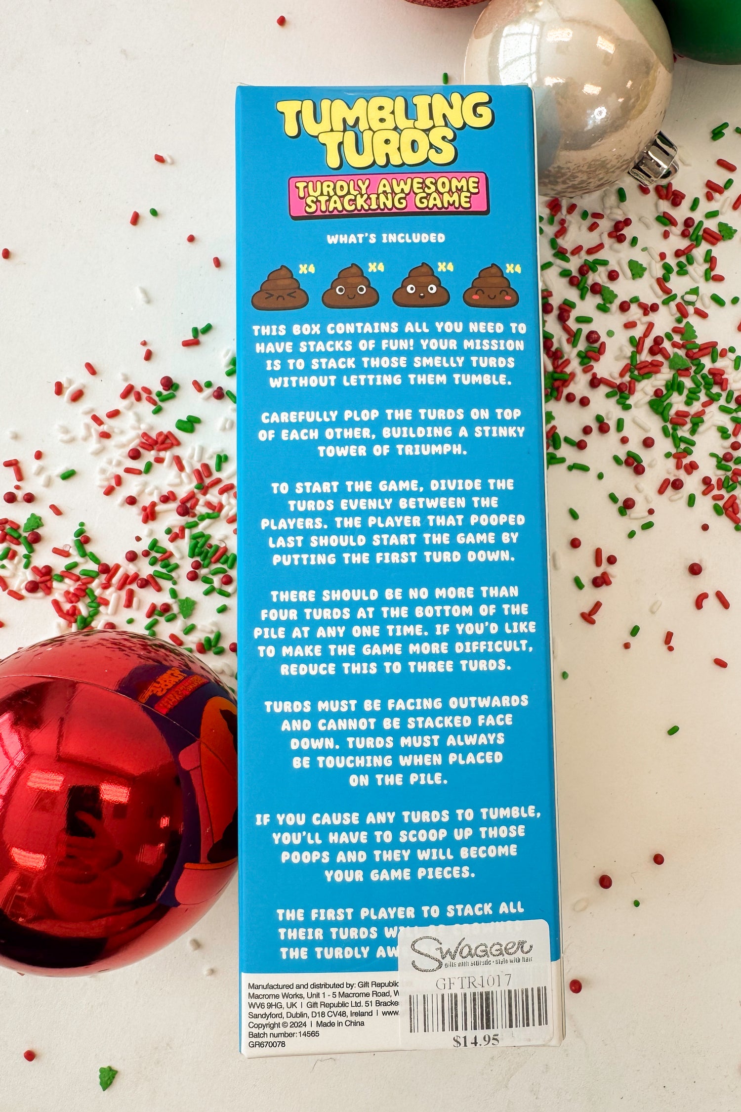 Box of Tumbling Turtles stacking game with blue background and yellow text