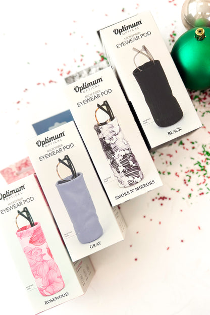 Eyeglass cases with a pair of glasses on a white background