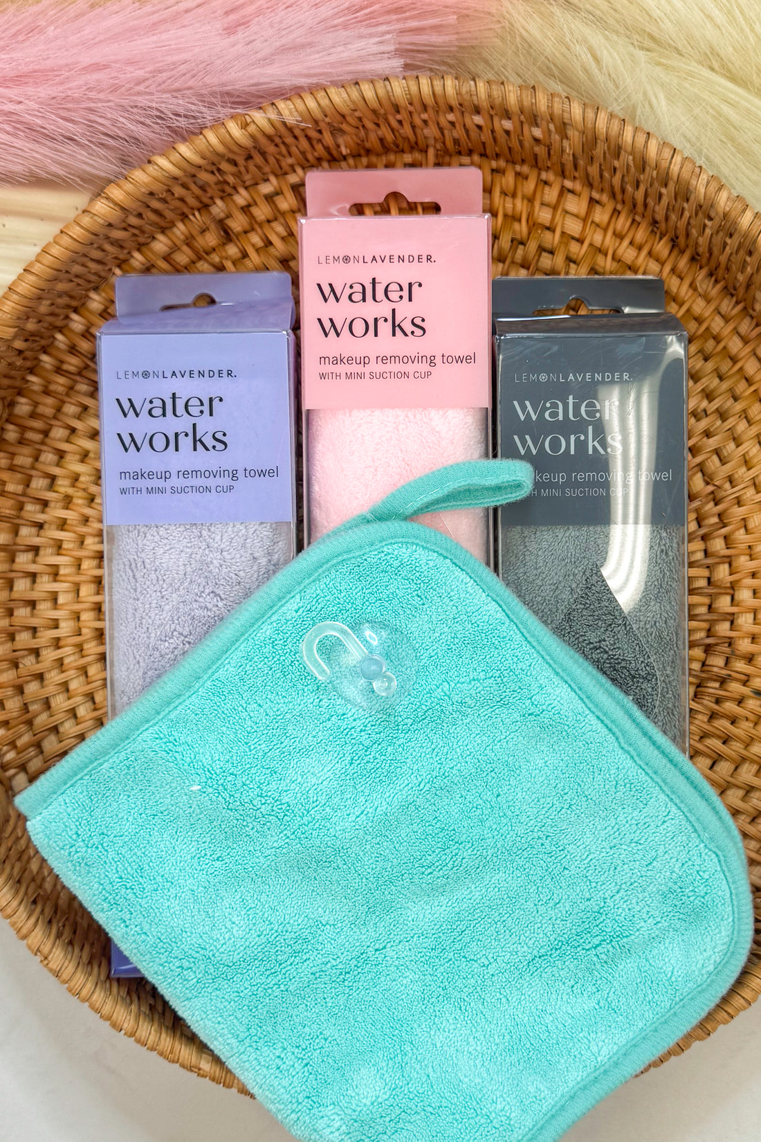 Makeup removing towels with packaging in a woven basket