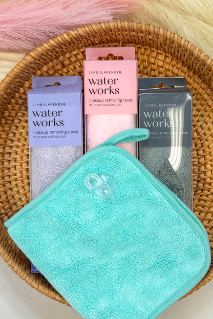 Makeup removing towels with packaging in a woven basket