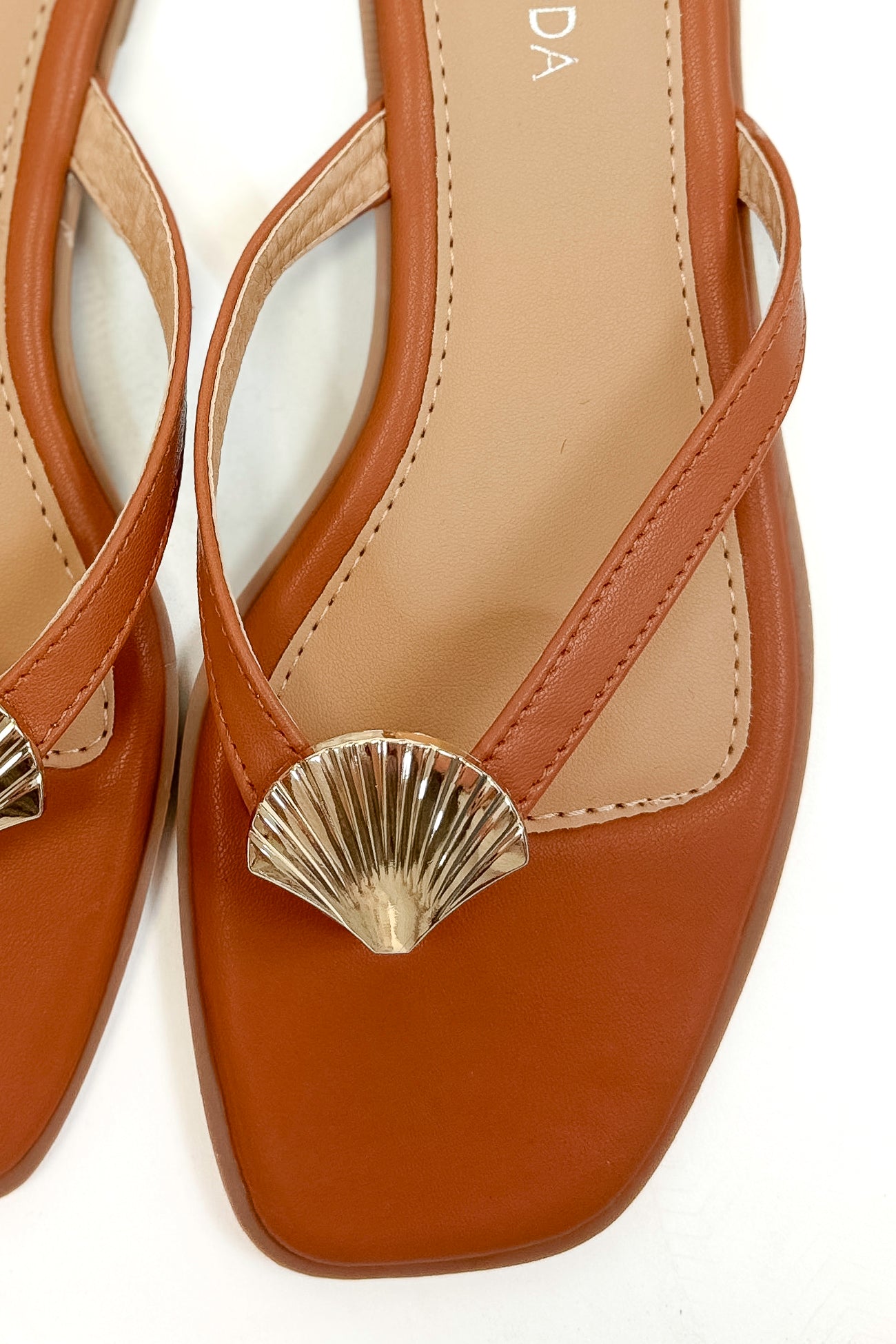 Doha- Tan Shell Detail Flip Flops top detail view