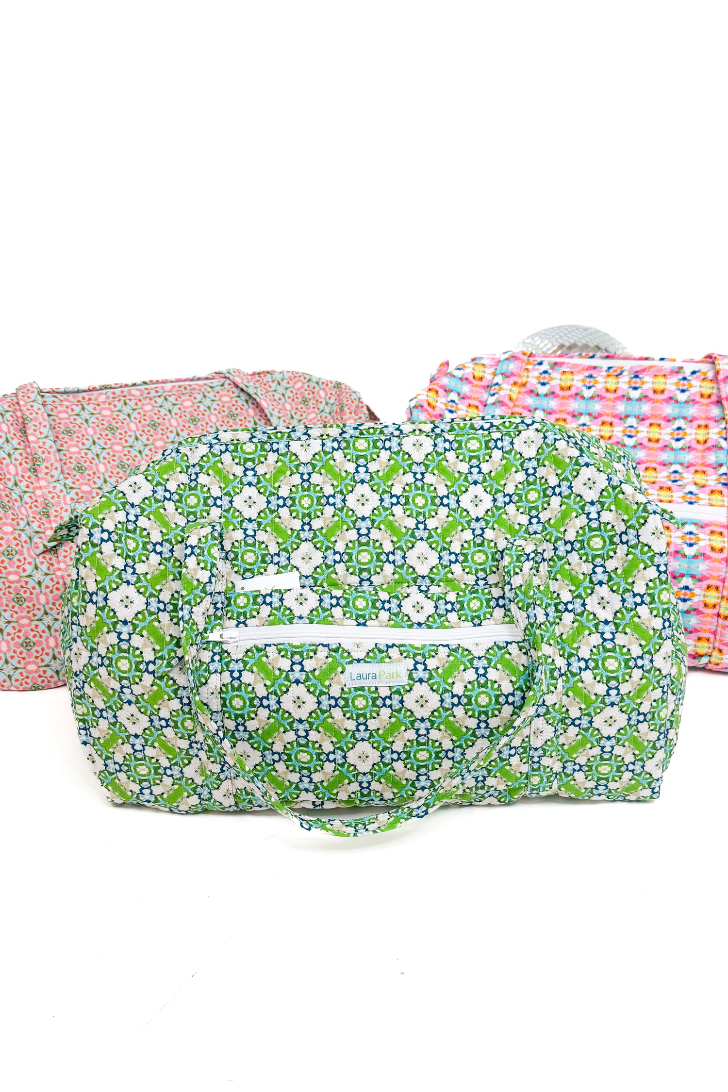Floral-patterned bags on a white background