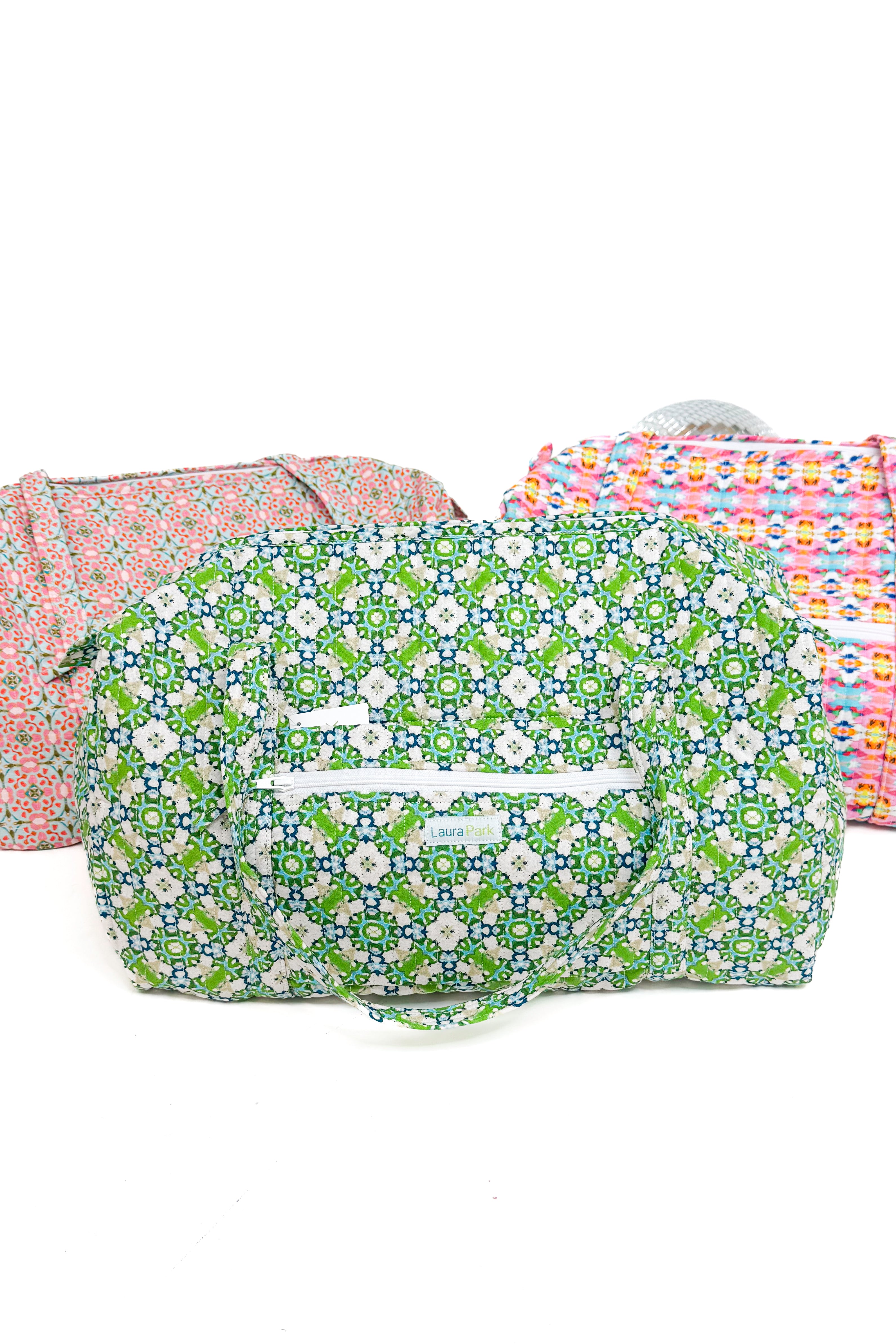 Floral-patterned bags on a white background