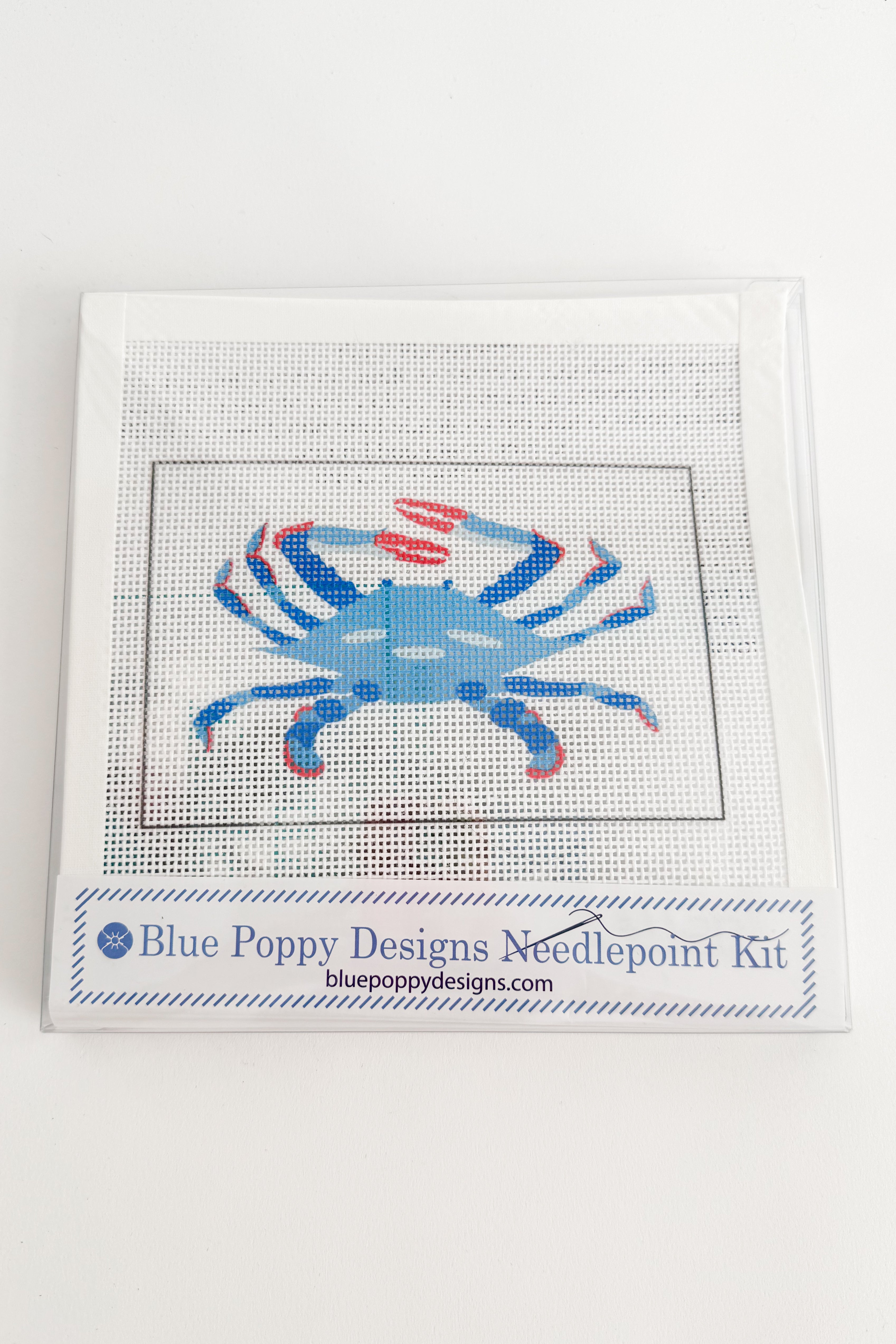 Blue crab needlepoint kit by Blue Poppy Designs on a white background
