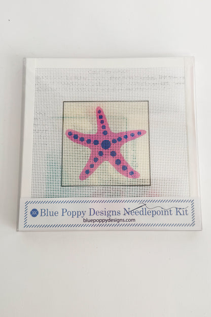 Blue Poppy Designs needlepoint kit with a pink starfish design on a white background