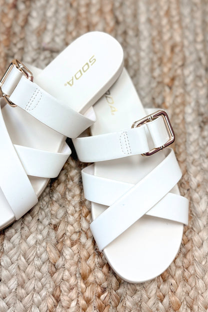 Terse- Bone Multi Strap Buckle Detail Sandal against neutral background.