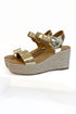 Jena Gold and Rattan Wedge shoes against white studio background.