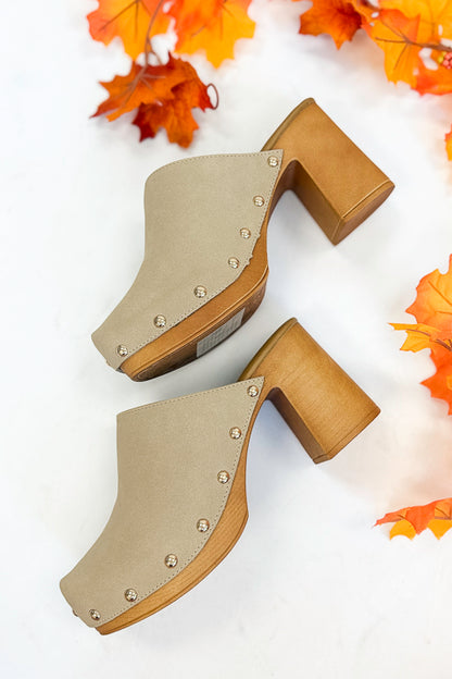 Jungle- Beige Studded Clogs against studio background side view