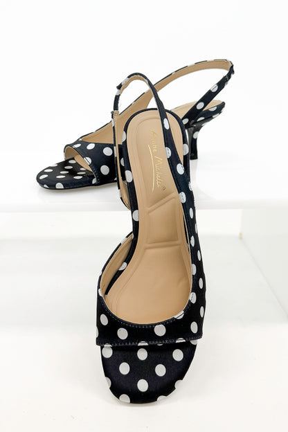 Keep- Black &amp; White Polka Dot Kitten Heels against white studio background front view.