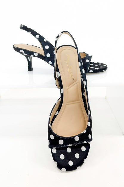 Keep- Black &amp; White Polka Dot Kitten Heels against white studio background front view.