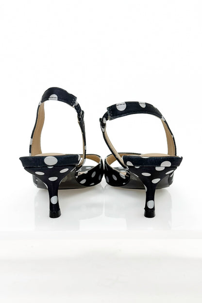 Keep- Black &amp; White Polka Dot Kitten Heels against white studio background back view.