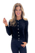 Front view of woman wearing Black With Rhinestone Buttons Eyelash Cardigan with jeans against white studio background. 
