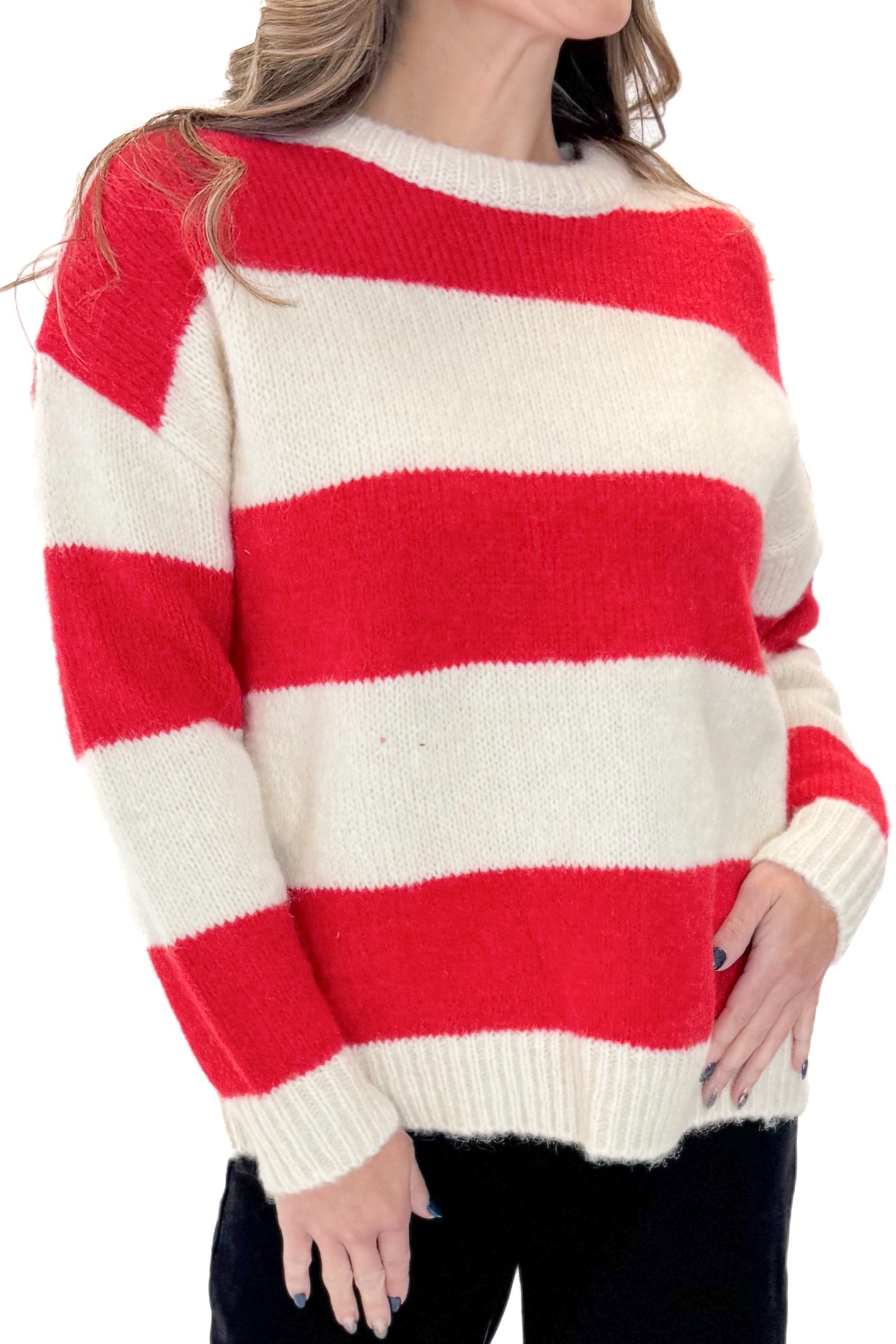 Front detail view of woman wearing Ivory &amp; Red Striped Sweater with jeans against white studio background.