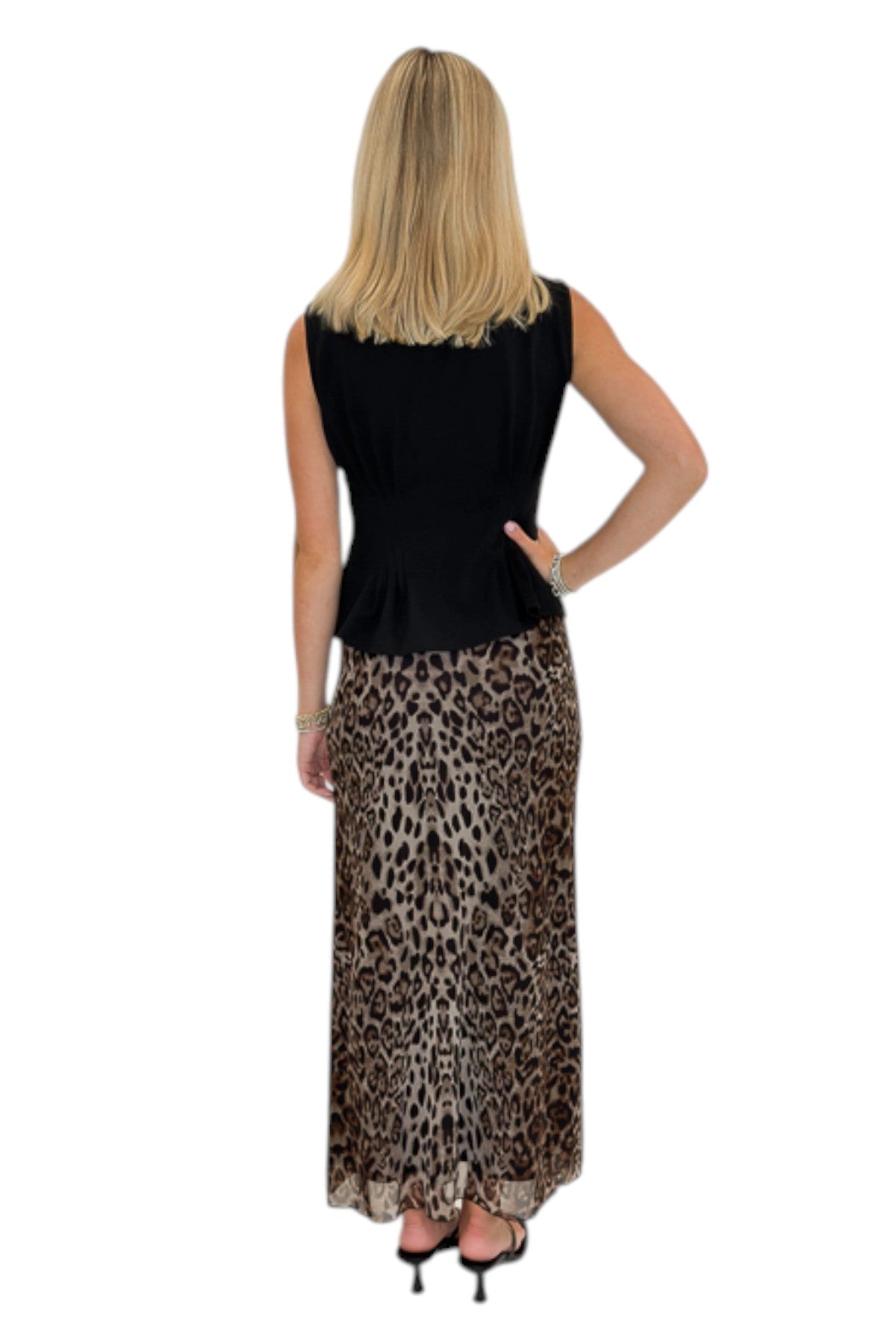 Back view of woman wearing Swagger Boutique’s Leopard Mesh Skirt with Black Mock Neck Pleat Waist Top by Entro against white studio background.