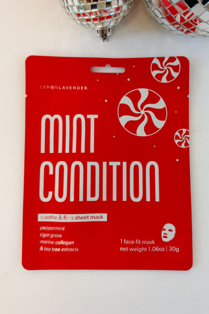Let It Glow Holiday Face Mask against holiday background-Mint Condition