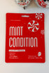 Let It Glow Holiday Face Mask against holiday background-Mint Condition