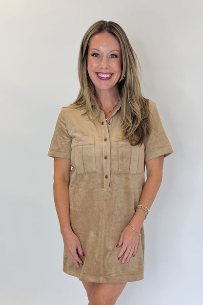 Front view of woman wearing Swagger Boutique’s Light Sand Leone Suede Mini Dress by Zsupply against white studio background.