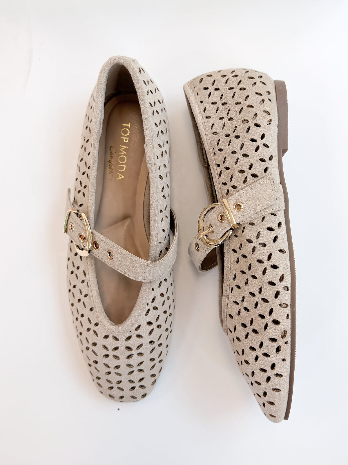 Linda- Sand Suede Flats against white studio background. 