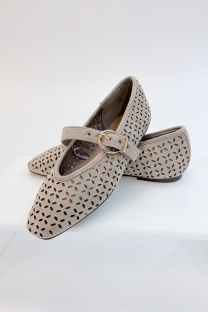 Linda- Sand Suede Flats against white studio background. 