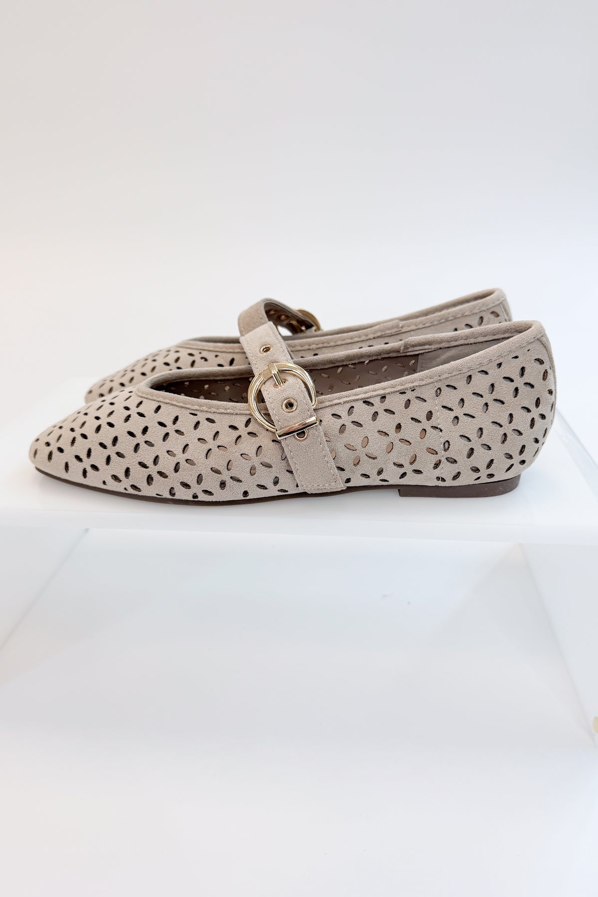 Linda- Sand Suede Flats against white studio background side view.