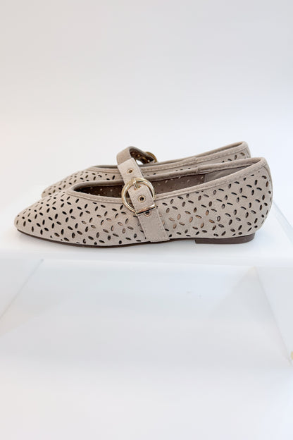 Linda- Sand Suede Flats against white studio background side view.