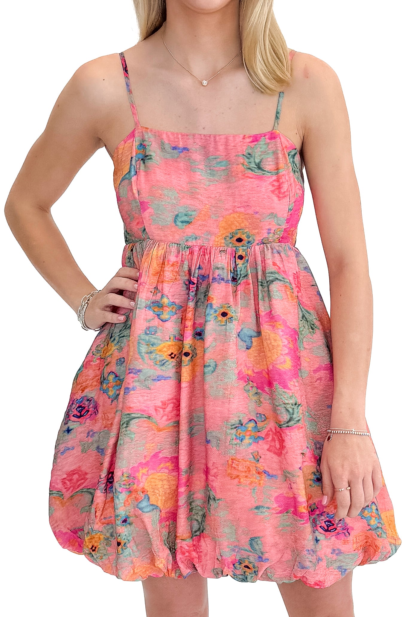 Front detail view of woman wearing Pink &amp; Multi Printed Bubble Hem Tank Dress against white studio background.