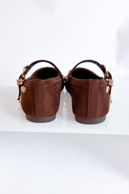 Mayhap- Brown Studded Flats against white background.