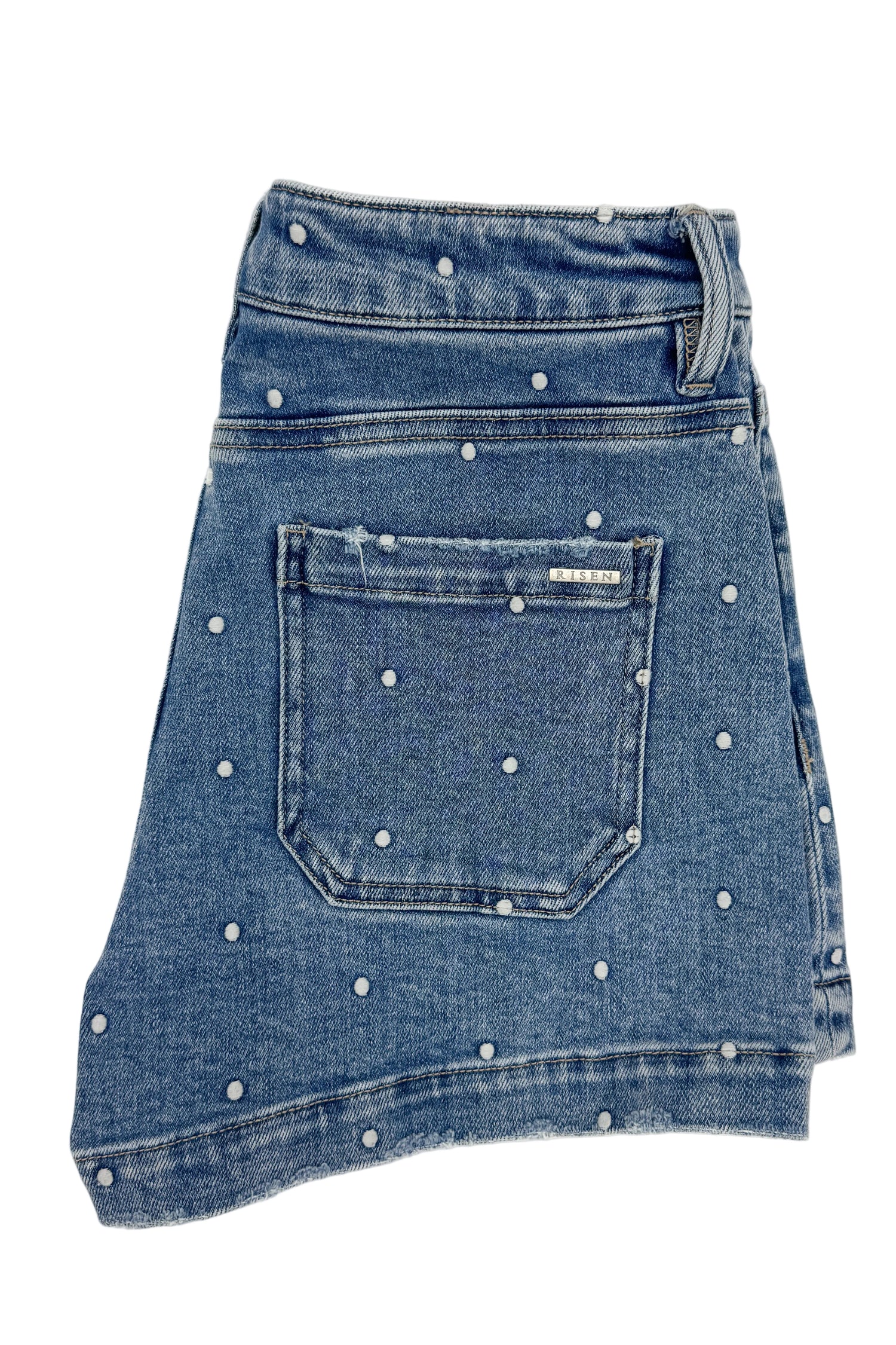 Swagger Boutique’s Medium Wash Polka Dot Denim Shorts against white studio background.