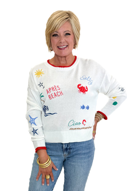 Front view of woman wearing Swagger Boutique’s Multi Seas The Day Sienna Sweater by Z Supply with jeans against white studio background.