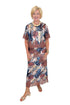 Front view of woman wearing Swagger Boutique’s Multi Snake Print Lace Trim Top with Multi Snake Print Lace Trim Midi Skirt against white studio background.