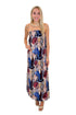 Front view of woman wearing Swagger Boutique’s Multi Snake Print Strapless Maxi Dress with heels against white studio background.