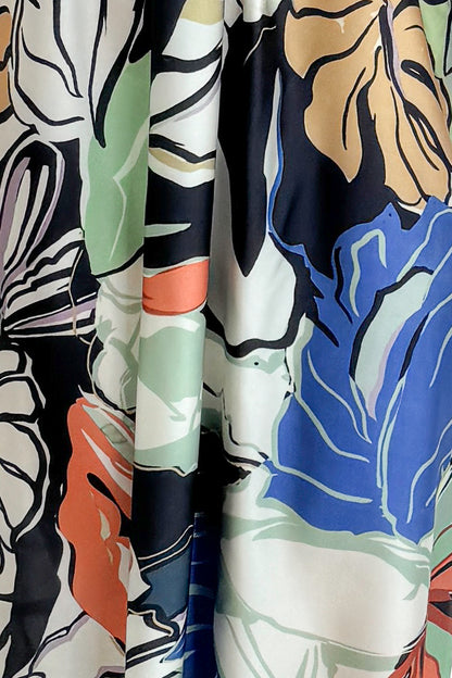 Swagger Boutique’s Multi Tropical Print Halter Neck Maxi fabric.