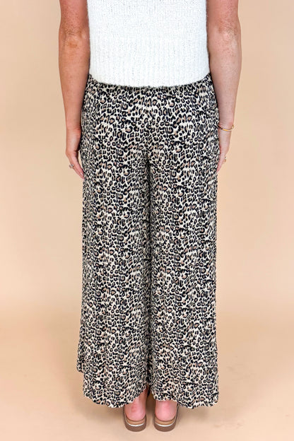 Leopard print textured pants - back view highlighting the wide leg silhouette and pleated details