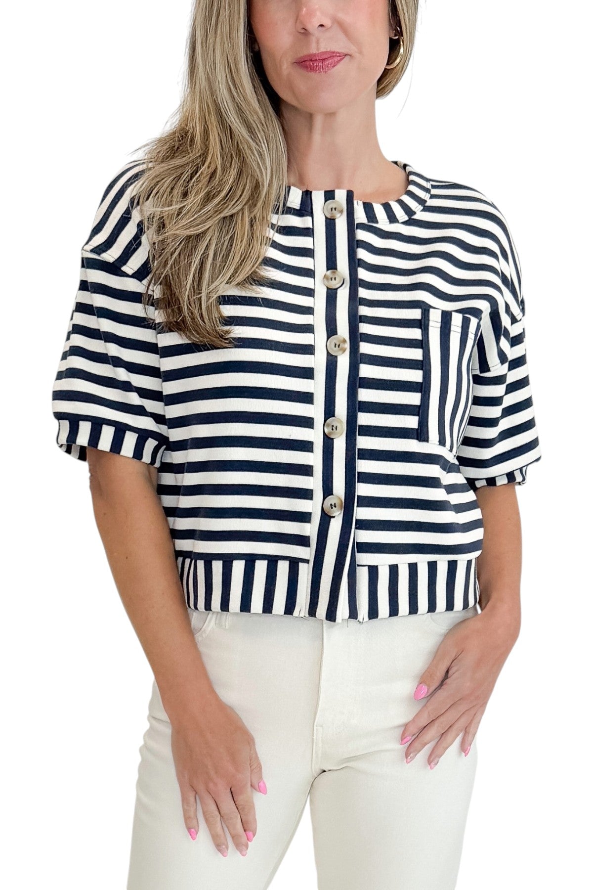 Front detail view of woman wearing Swagger Boutique’s Navy Striped Short Sleeve Button Up Top with jeans against white studio background.