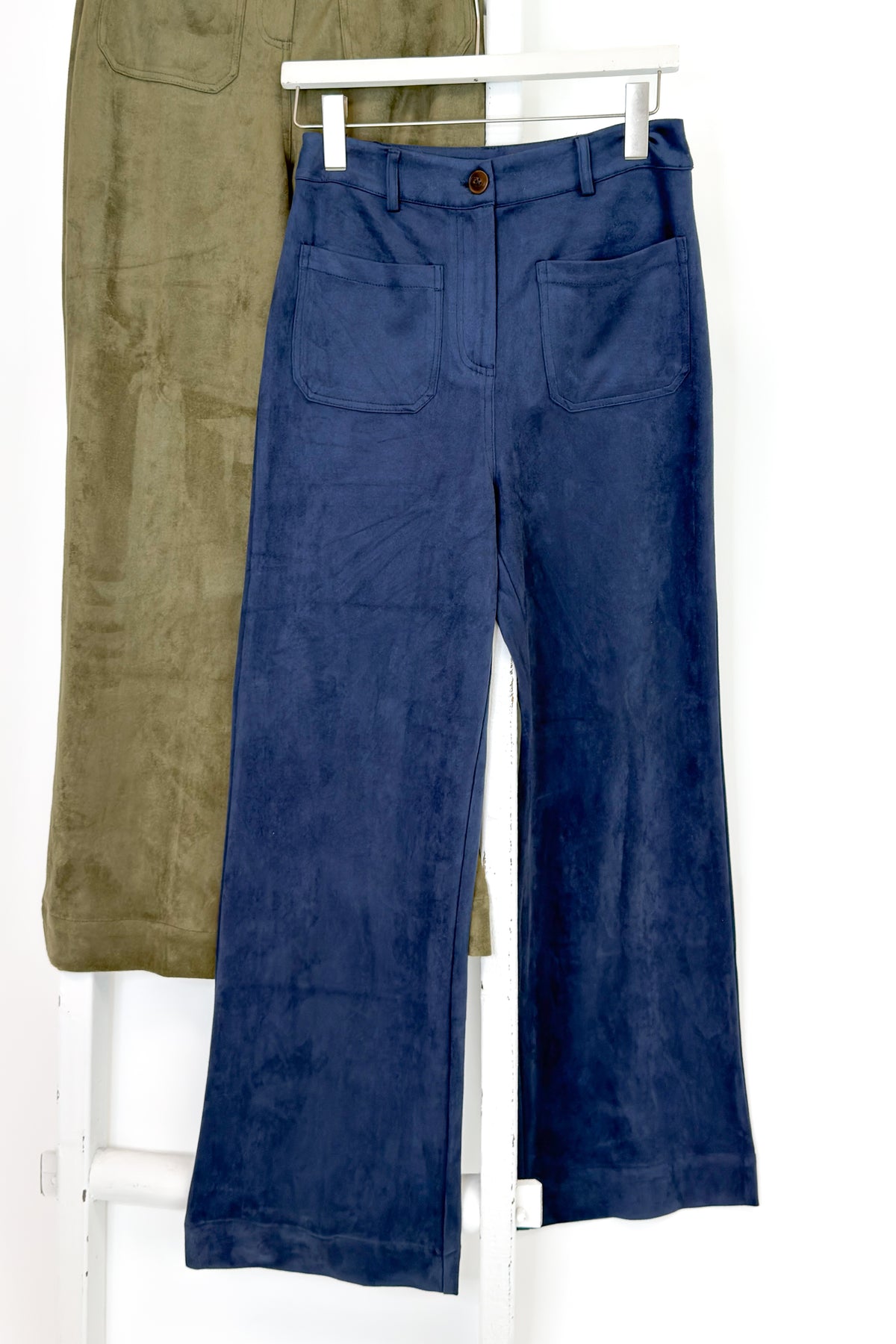 Front view Swagger Boutique’s Navy Suede Wide Leg Pants and Olive version  against white studio background.
