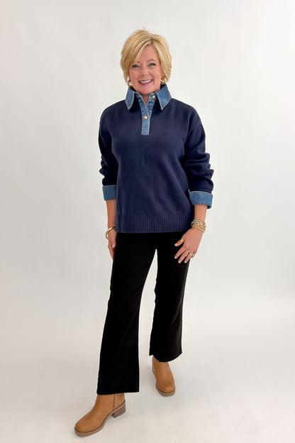 Front view of woman wearing Swagger Boutique’s Navy &amp; Denim Collared Sweater with jeans against white studio background.